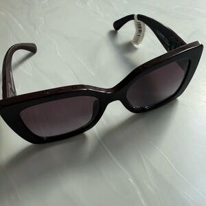 CHANEL Black Cat-Eye Sunglasses with Glossy Finish